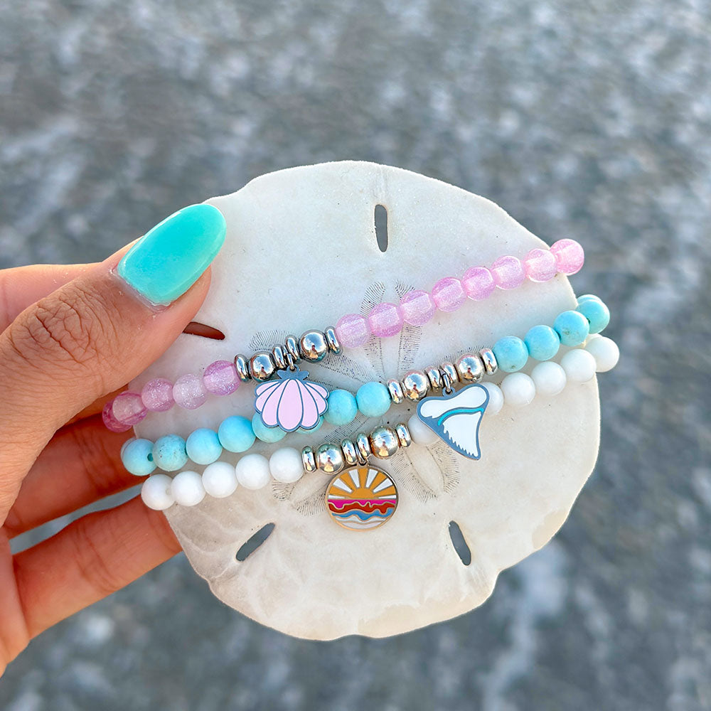 HELP by TJ Caroline x H.E.L.P. Seashell Charm with Pink Glass Shimmer Charity Bracelet