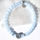 HELP by TJ Mama Collection: Blue Selenite with Mama CZ Bead Charity Bracelet