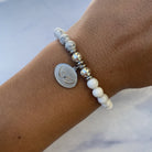 HELP by TJ Angel Wings Charm with Howlite Beads Charity Bracelet