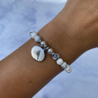 HELP by TJ Cardinal Charm with Howlite Beads Charity Bracelet