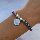 HELP by TJ Lucky Elephant Charm with Rainbow Hematite Beads Charity Bracelet